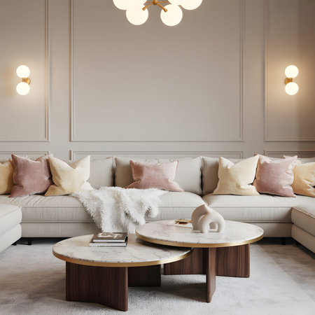 A modern living room features a large sectional sofa with plush pillows and a fluffy throw.