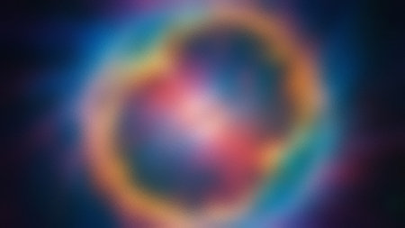 Abstract circular swirl of rainbow colors with a frosted glass effect and soft focus.