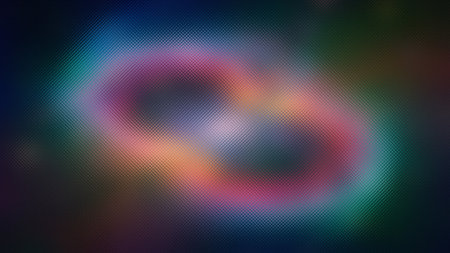 Dark abstract with a frosted glass texture and a blurred neon glow of pink and orange.の写真素材