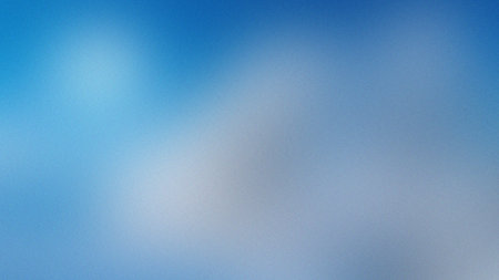 A light blue and white gradient background with soft light and a subtle grainy texture.
