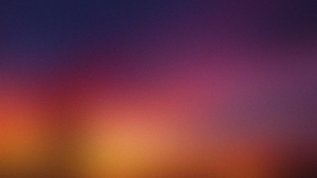 Vibrant gradient of orange, pink, and purple with a subtle grain texture. Clear details and vibra...の写真素材
