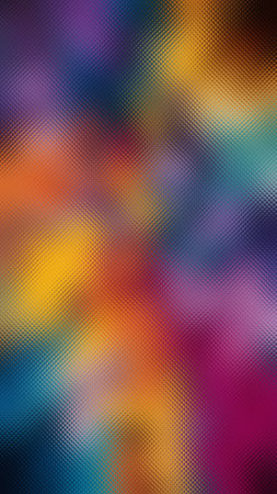 Abstract background with a multicolor gradient swirling behind a frosted glass texture.の写真素材