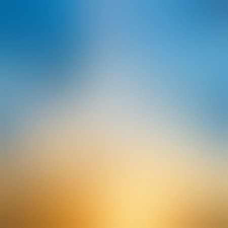 Softly blurred abstract background transitioning from sky blue to warm orange with a gentle...の写真素材