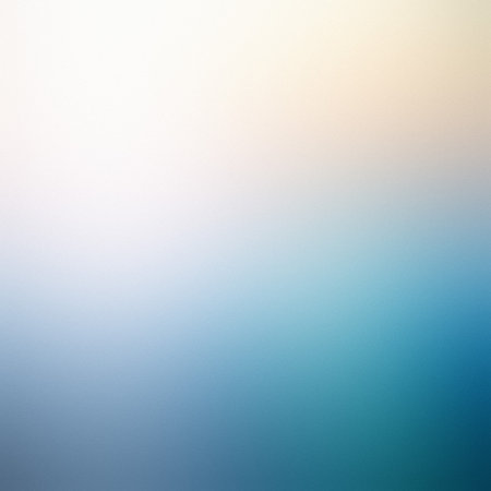 A soft gradient transitions from white at the top to teal blue with a hint of yellow.の写真素材