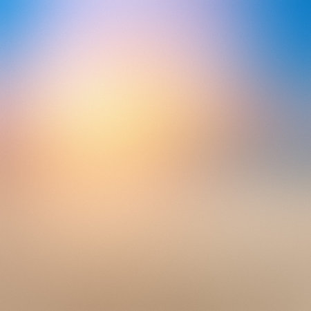 A soft, blurred gradient transitions from a light blue sky to warm yellow and peach tones.