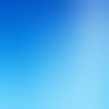A vibrant gradient of deep blue sky fading to lighter blue. Clear details and vibrant colors enha...の写真素材