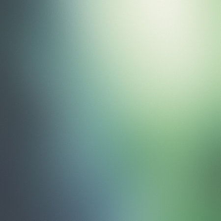 A soft gradient transitioning from teal to light green with a subtle grainy texture.の写真素材