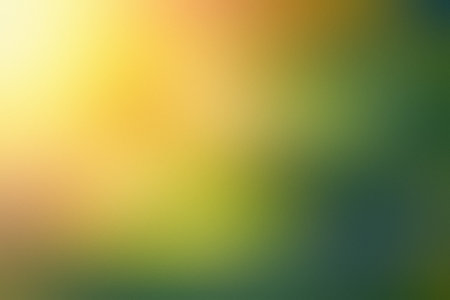 Bright yellow to dark green soft gradient blur with subtle light. Clear details and vibrant color...の写真素材