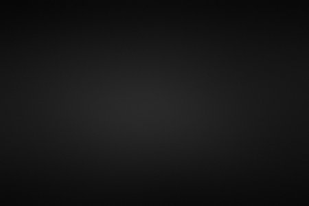 A plain dark gray textured background with a very subtle gradient of light. Clear details and vib...の写真素材