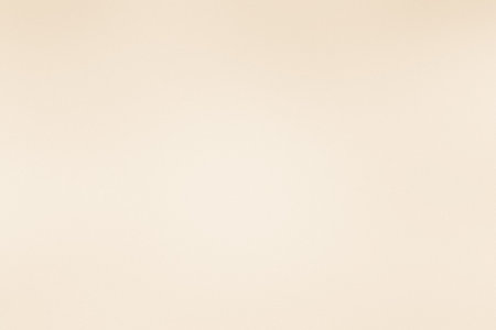 Background showing plain pale beige textured background. High resolution image suitable for...の写真素材