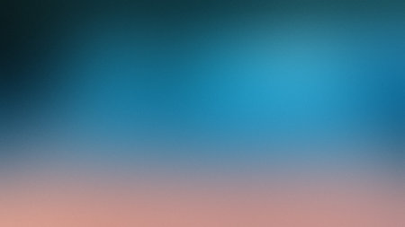 A smooth gradient transitions from a vibrant blue to a soft peach color. Clear details and vibran...の写真素材
