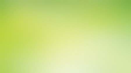 A soft gradient transitioning from bright green at the top to yellow at the bottom.の写真素材