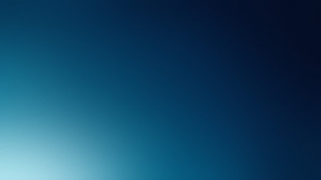 A smooth gradient from deep blue to teal with a soft light effect Clear details and vibrant color...の写真素材