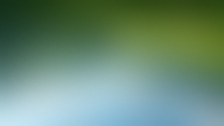 A gradient background features soft green and blue hues with a subtle frosted glass texture.の写真素材