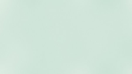A pale mint green solid color background with a very subtle, fine texture. Clear details and vibr...の写真素材