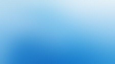 A smooth gradient transitions from a light sky blue to a deep blue. Clear details and vibrant col...の写真素材