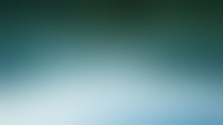 A smooth gradient of deep teal at the top fading to a lighter blue at the bottom. Clear details a...の写真素材