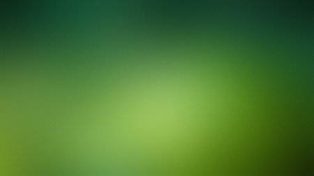 A vibrant green gradient with a subtle textured overlay and soft light diffusions. Clear details ...の写真素材