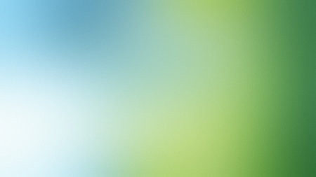 A smooth gradient of blue and green with subtle texture, evoking nature and freshness.の写真素材