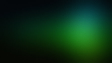 A dark green and black gradient with a bright green light highlight. Clear details and vibrant co...の写真素材