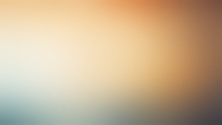 A gentle gradient background blending warm orange and beige with cool blue tones. Clear details a...の写真素材