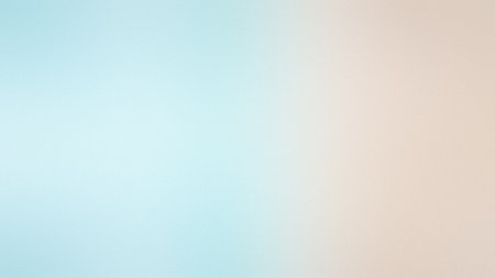 Background showing soft gradient background of light blue and pale peach colors. High resolution...の写真素材