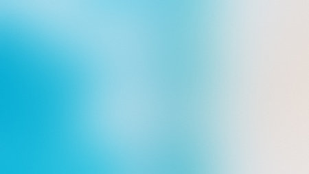 A soft smooth gradient blending from light blue to white with subtle texture Clear details and vi...の写真素材