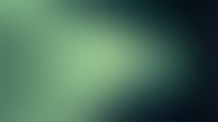 A soft green gradient with a subtle texture and a dark vignette on the right. Clear details and v...の写真素材