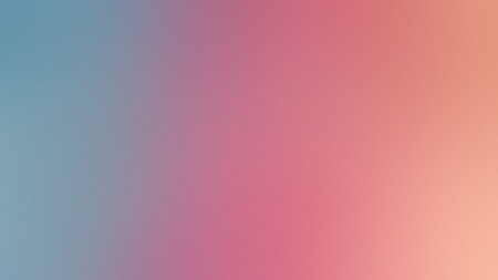 A smooth, blurred gradient blending soft pink and light blue colors for a gentle transition.の写真素材