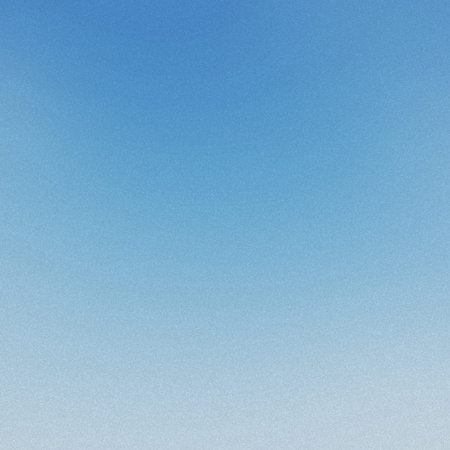 A clear blue sky gradient background with a soft, subtle grain texture fading to lighter blue.