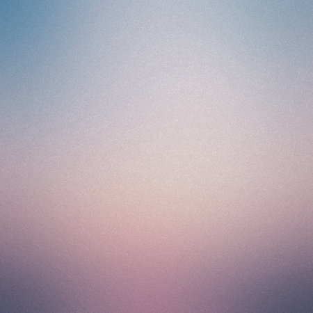 A pastel gradient blends pale blue, pink, and purple with a subtle grain texture for a soft look.の写真素材