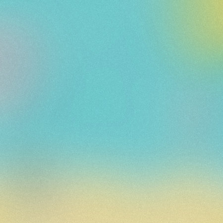 A soft gradient transitioning from blue and teal to yellow, with a subtle grainy texture.の写真素材