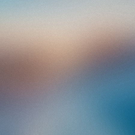 A soft blue and beige gradient with a subtle grain texture and diffused light. Clear details and ...の写真素材