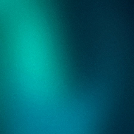 A vibrant turquoise and deep blue gradient background with a subtle grain texture, creating depth.の写真素材