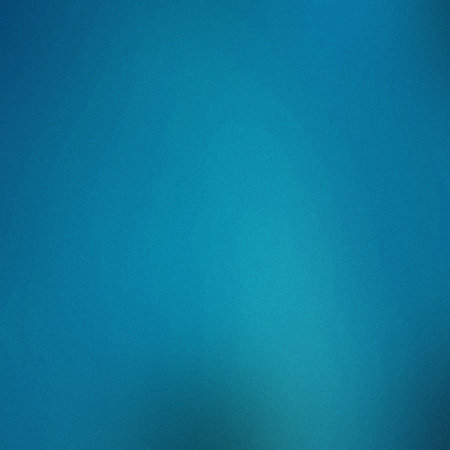 A vibrant blue gradient with darker tones at the bottom and a fine grain texture. Clear details a...の写真素材