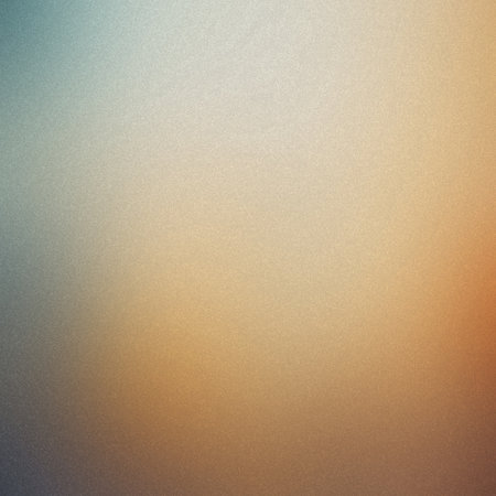 A warm gradient blending blue, beige, and orange with a subtle grain texture. Clear details and v...の写真素材