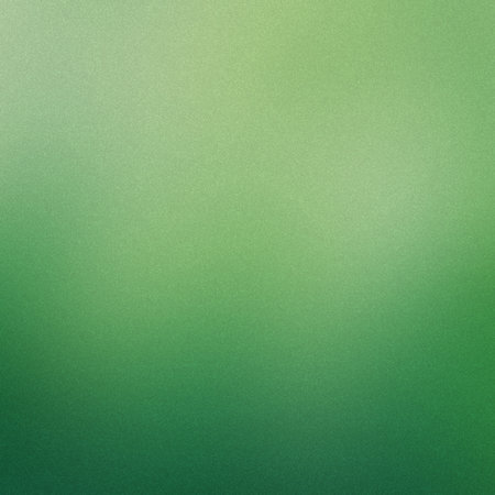 A vibrant green gradient background with a fine grain texture and subtle noise. Clear details and...の写真素材