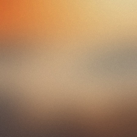 A warm gradient background with orange and brown tones and a subtle grain texture. Clear details ...の写真素材