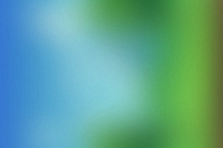 A blurred gradient background with a subtle grain texture, blending blue and green tones.