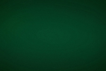 A solid dark green textured background with a subtle grain and soft focus effect. Clear details a...