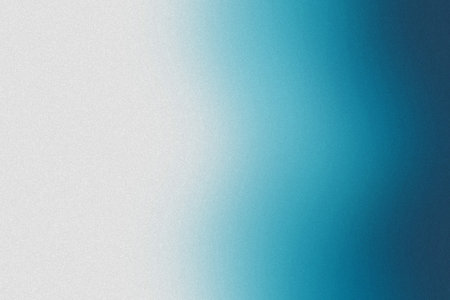 A soft gradient transitions from white to teal with a subtle grain texture. Clear details and vib...の写真素材