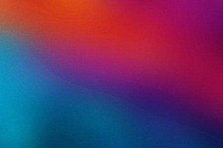 A vibrant gradient background showcases a smooth blend of red, purple, and blue colors with...の写真素材