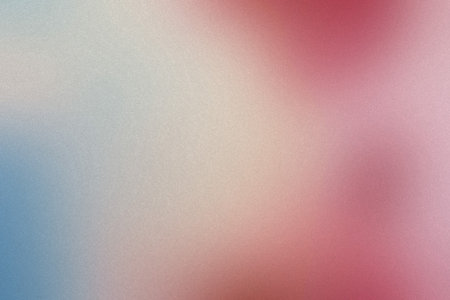 A soft, blurred gradient of blue, pink, and cream with a subtle grainy texture. Clear details and...の写真素材