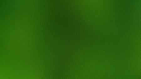 A deep green background with a subtle grain texture and soft diffused light. Clear details and vi...の写真素材