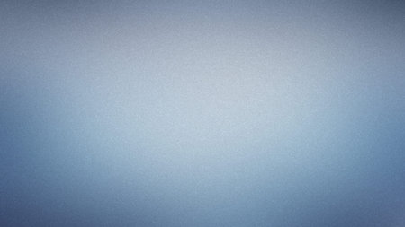 Photo showing light blue and grey gradient with subtle grain texture. High resolution image...の写真素材