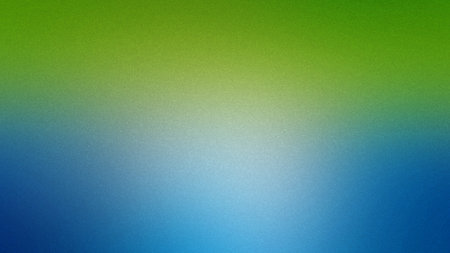 A smooth gradient blending green and blue with a fine grain texture. Clear details and vibrant co...の写真素材