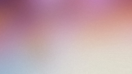 A gentle pastel gradient background in pink, purple, and orange hues with a subtle grain.の写真素材