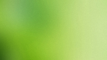 A vibrant green gradient with a fine grain texture creates a fresh backdrop. Clear details and vi...の写真素材