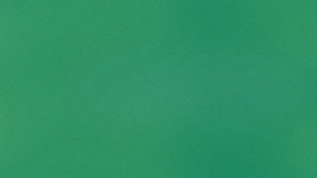 A vibrant medium green background with a subtle grainy texture and uniform color. Clear details a...