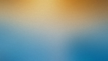 A gradient blends warm orange at the top to cool blue at the bottom with a subtle grain texture.の写真素材